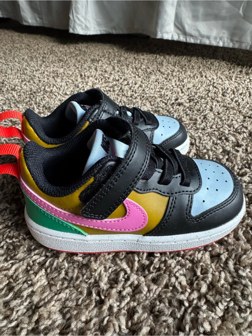 Nike Kids Low-Top Sneakers in Black/Light Blue with Pink & Yellow Accents